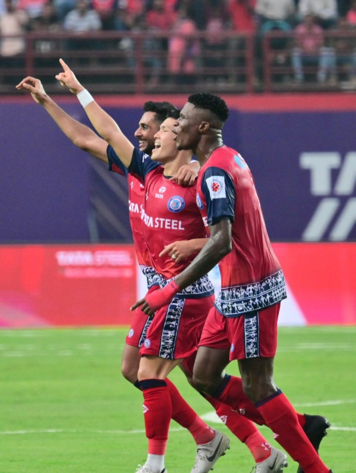 Jamshedpur FC players celebrate the opening goal against East Bengal during their ISL match in Jamshedpur, on Saturday