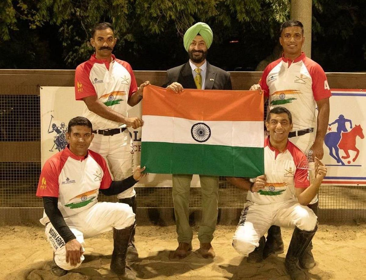 The Indian Army team celebrate winning their polo match against US Military