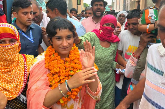 Vinesh Phogat with Congress supporters after her victory 