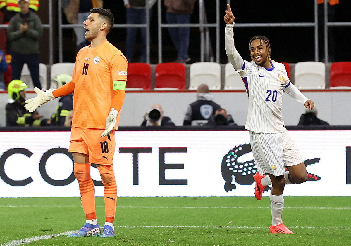 Bradley Barcola, right, celebrates scoring France's fourth goal against Israel