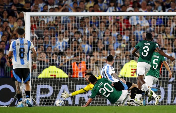 Lionel Messi scores Argentina's sixth goal to complete his hat-trick 