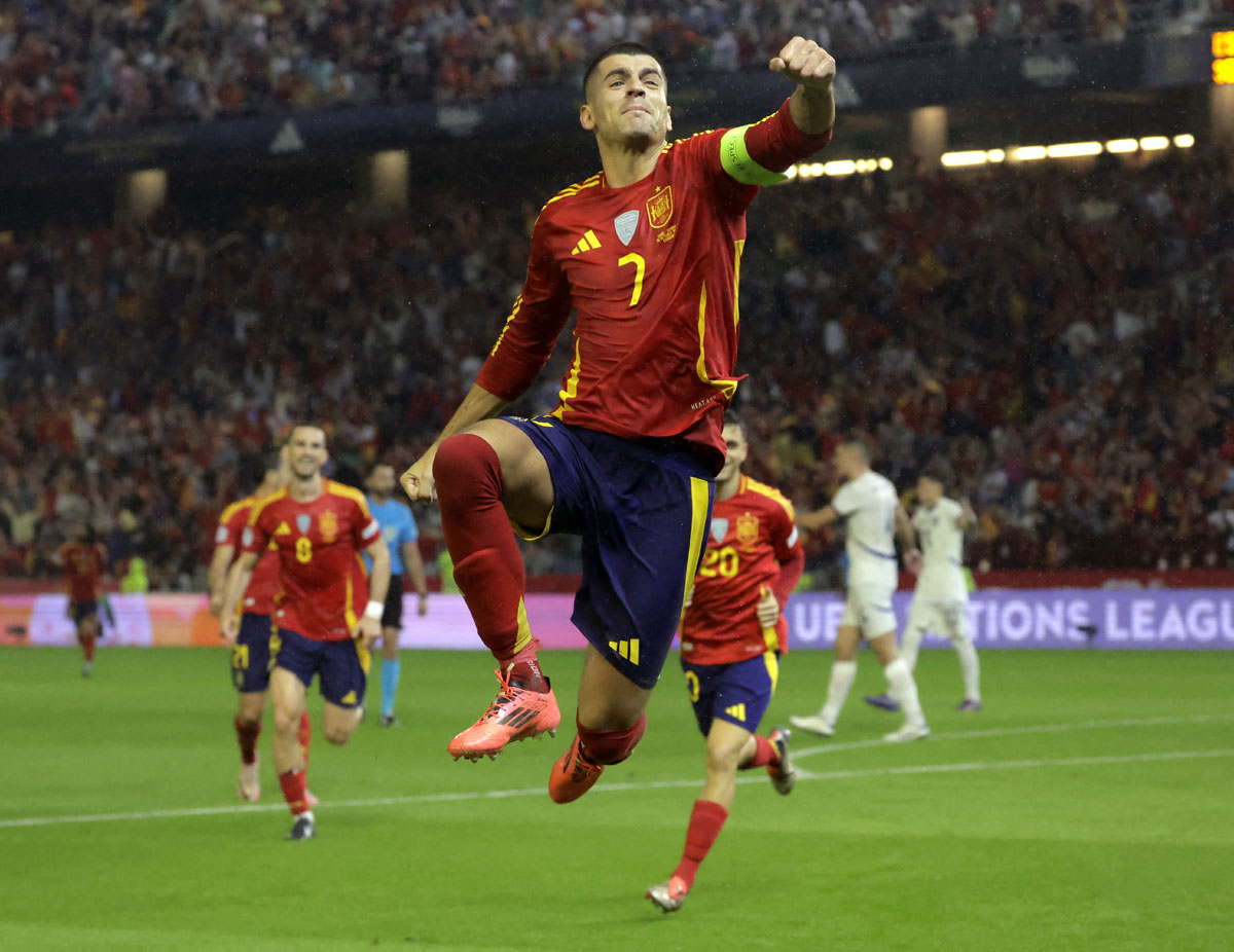 Alvaro Morata celebrates scoring Spain's second goal