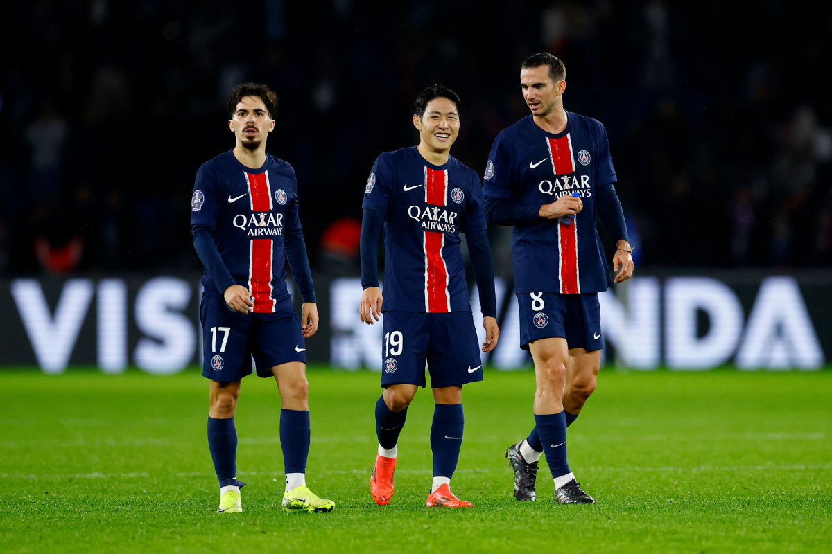 Paris St Germain's Vitinha, Lee Kang-in and Fabian Ruiz celebrate after their Ligue 1 win over RC Strasbourg at Parc des Princes, Paris 