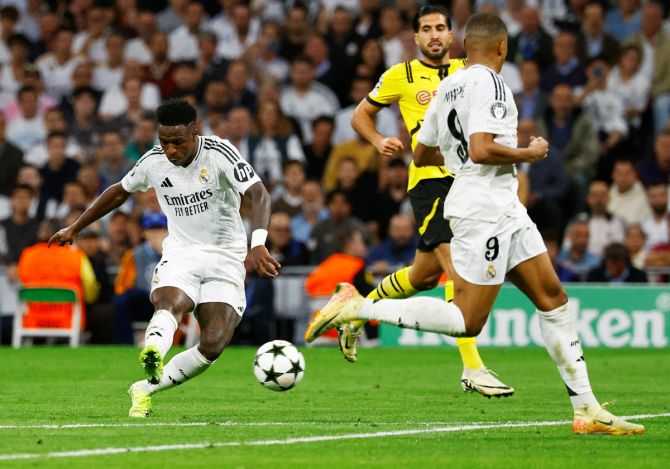 Vinicius Junior scores Real Madrid's fourth goal against Borussia Dortmund