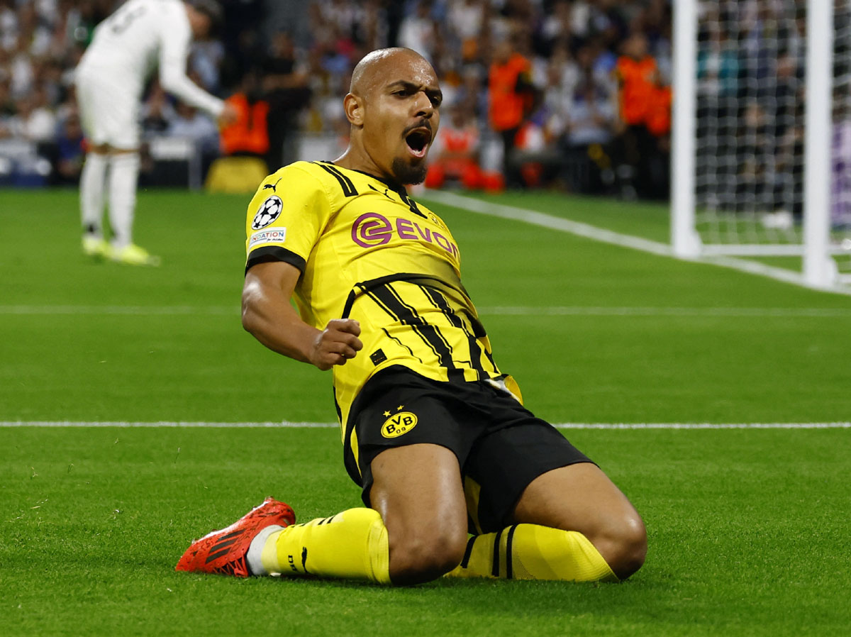 Donyell Malen celebrates scoring Borussia Dortmund's first goal