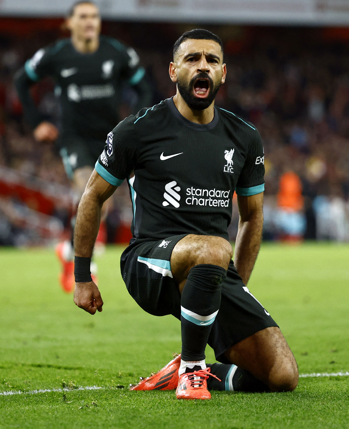 Liverpool's Mohamed Salah celebrates scoring their second goal