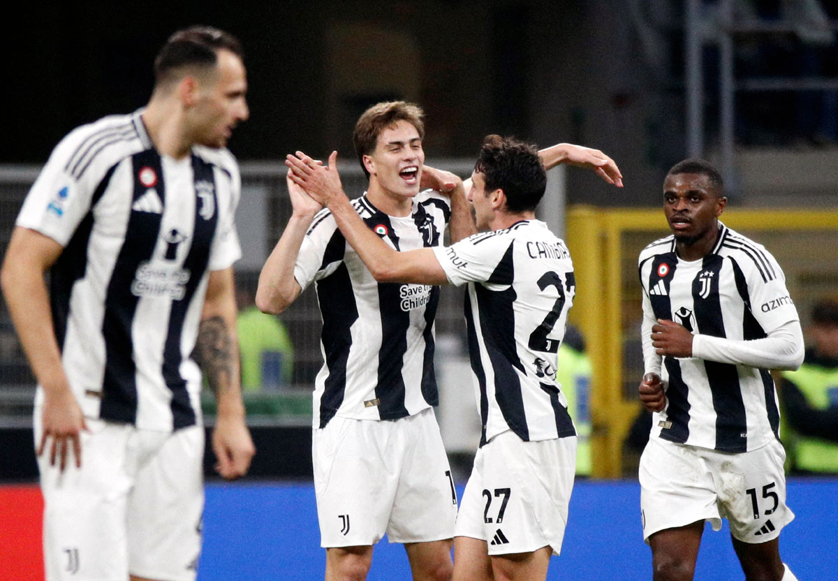 Juventus' Kenan Yildiz celebrates scoring their fourth goal with teammates