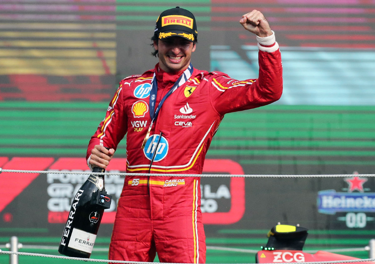 Ferrari's Carlos Sainz Jr. celebrates on the podium