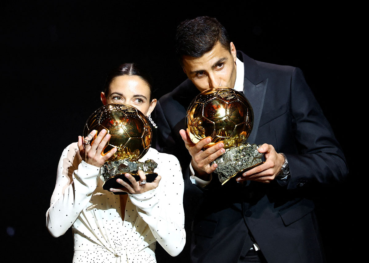 Rodri and Barcelona's Aitana Bonmati with the Ballon d'Or