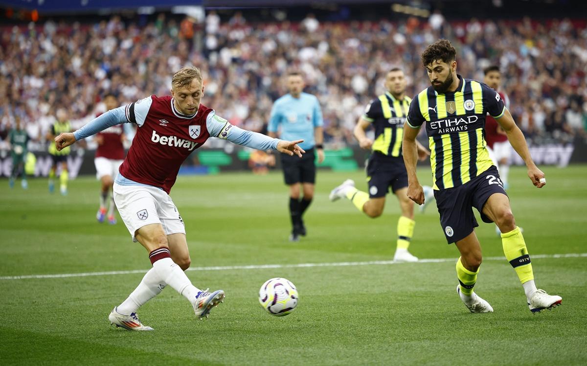 Manchester City's Ruben Dias deflects Jarrod Bowen's cross into his own net and West Ham equalise.