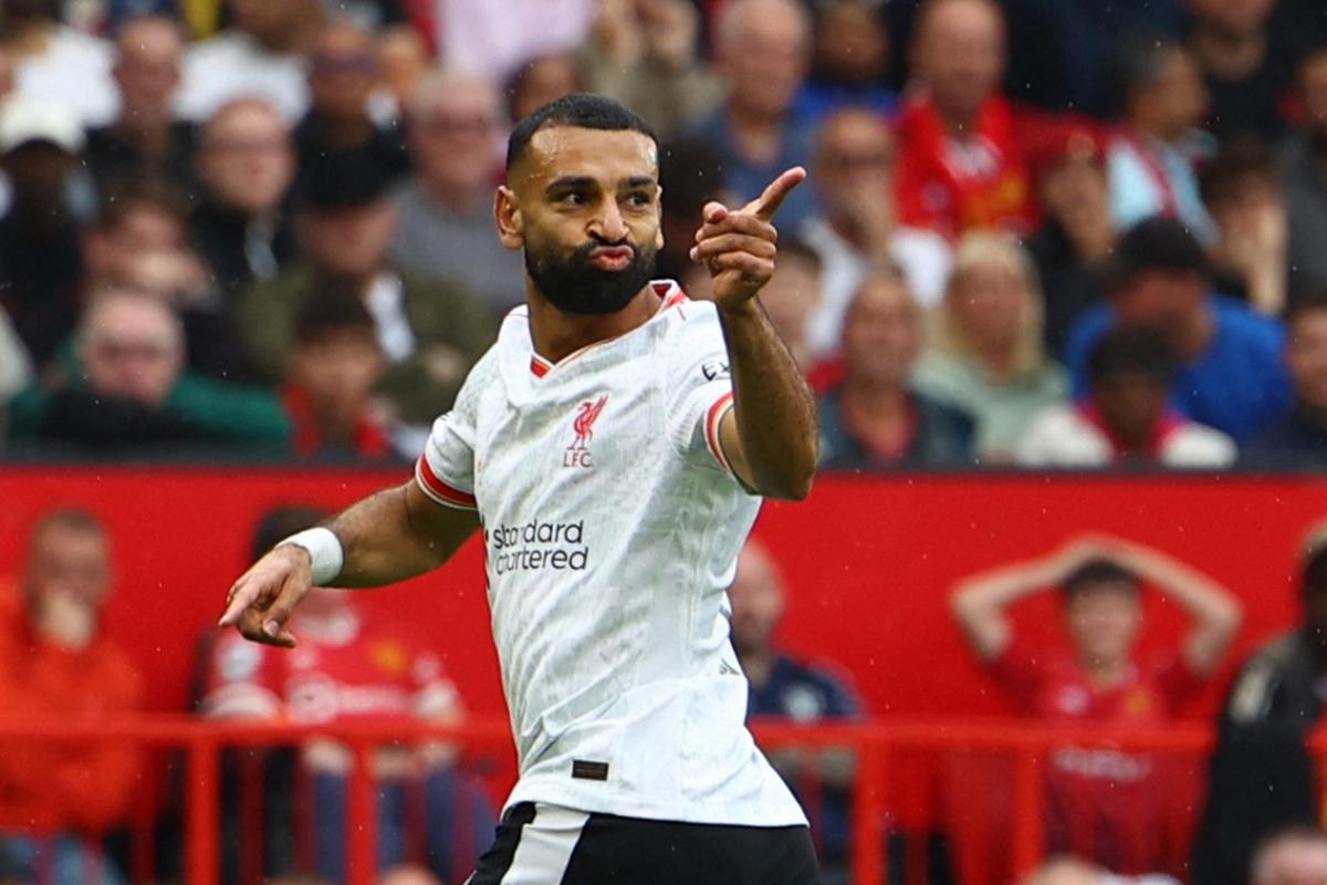 Liverpool's Mohamed Salah celebrates scoring their third goal against Manchester United at Old Trafford, Manchester, on Sunday