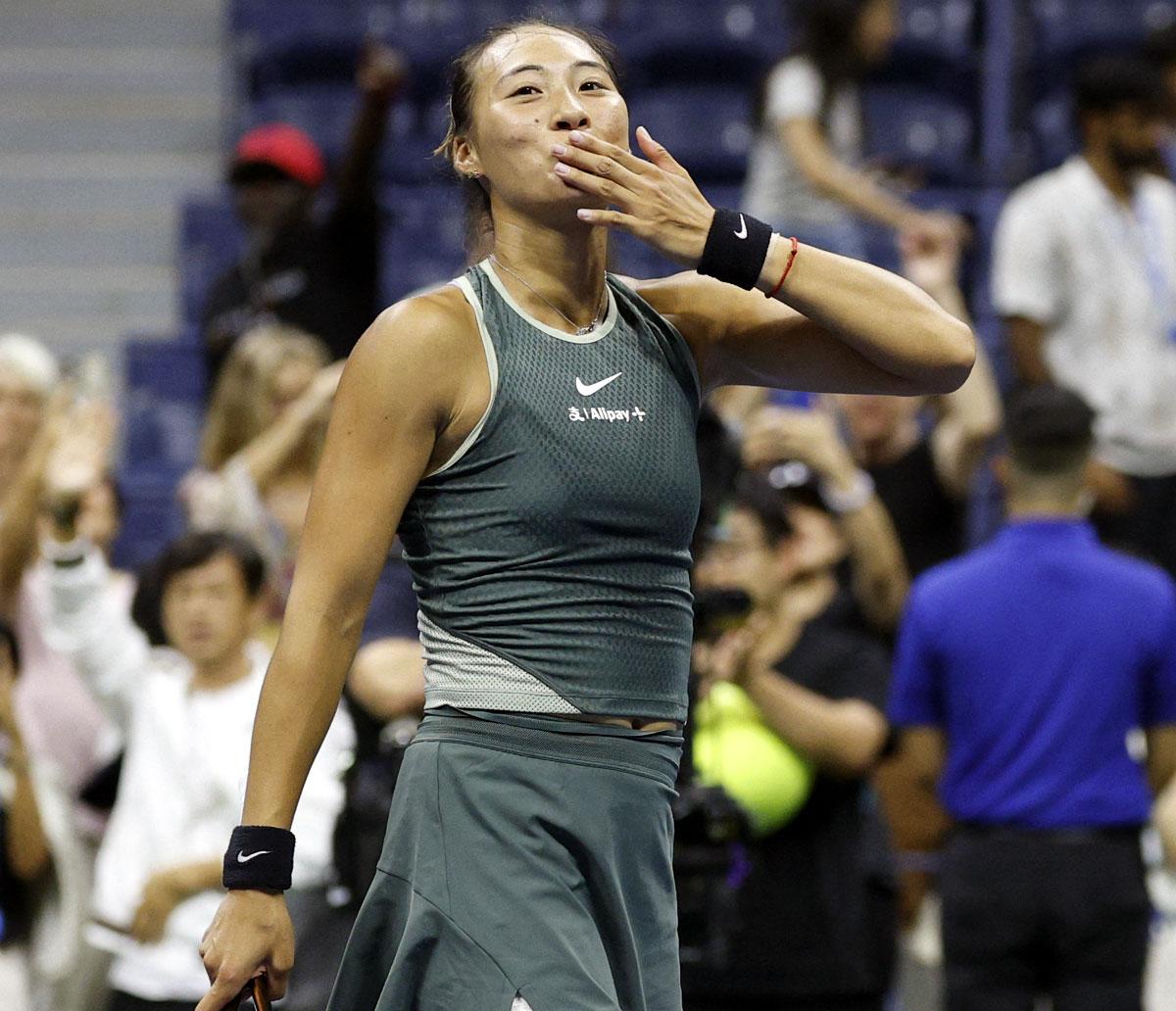 Qinwen Zheng celebrates winning her match against Donna Vekic