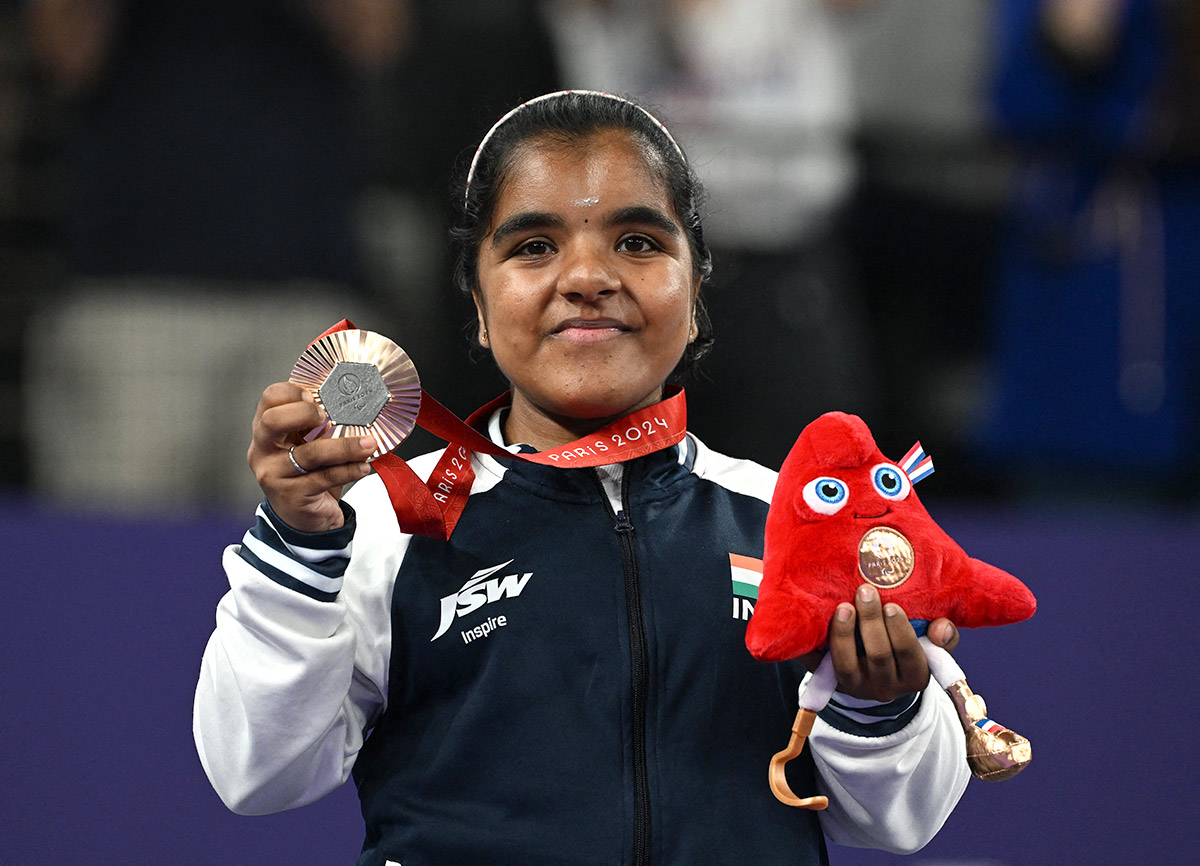 Nithya Sre Sumathy Sivan of India celebrates on the podium