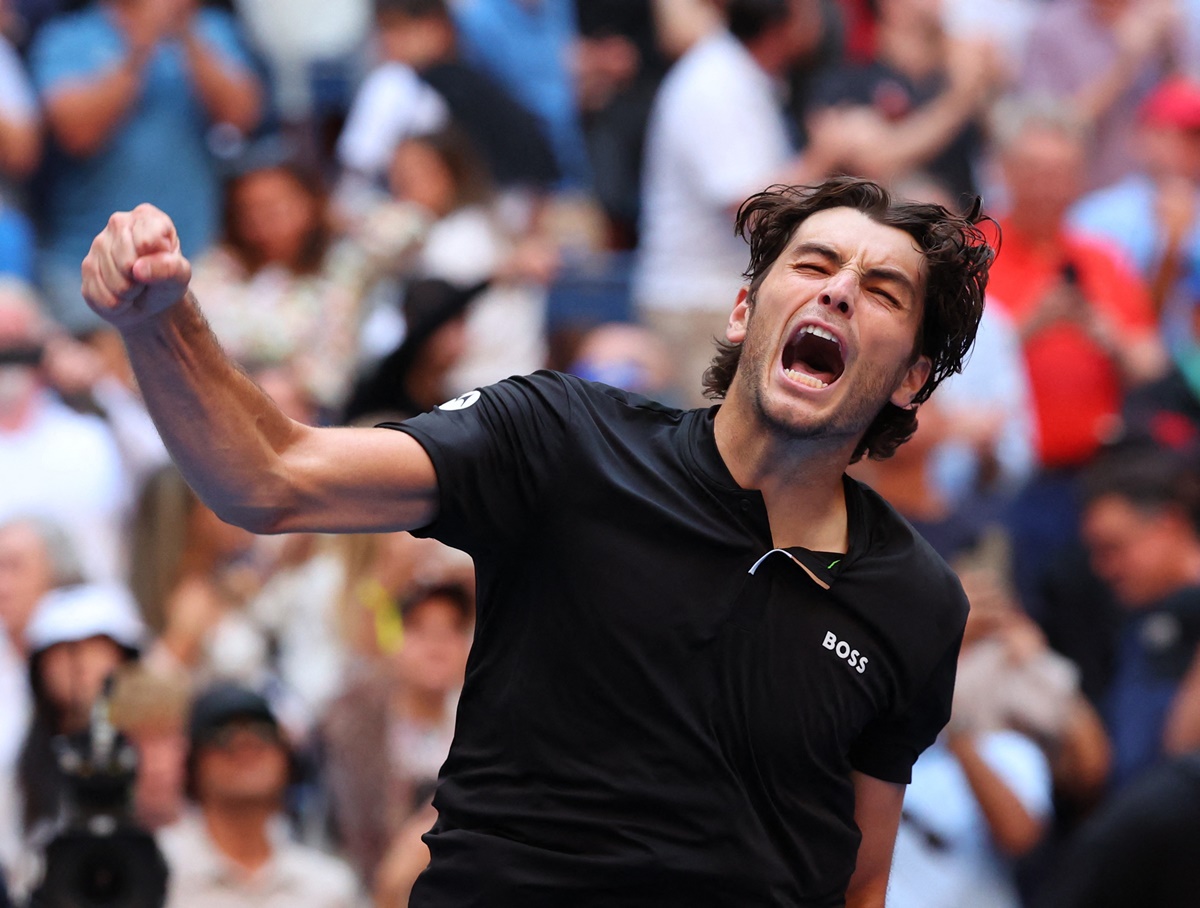 Taylor Fritz of the United States breaks into celebration after beating Germany's Alexander Zverev in the US Open men's singles quarter-finals, at Flushing Meadows, New York, on Tuesday.