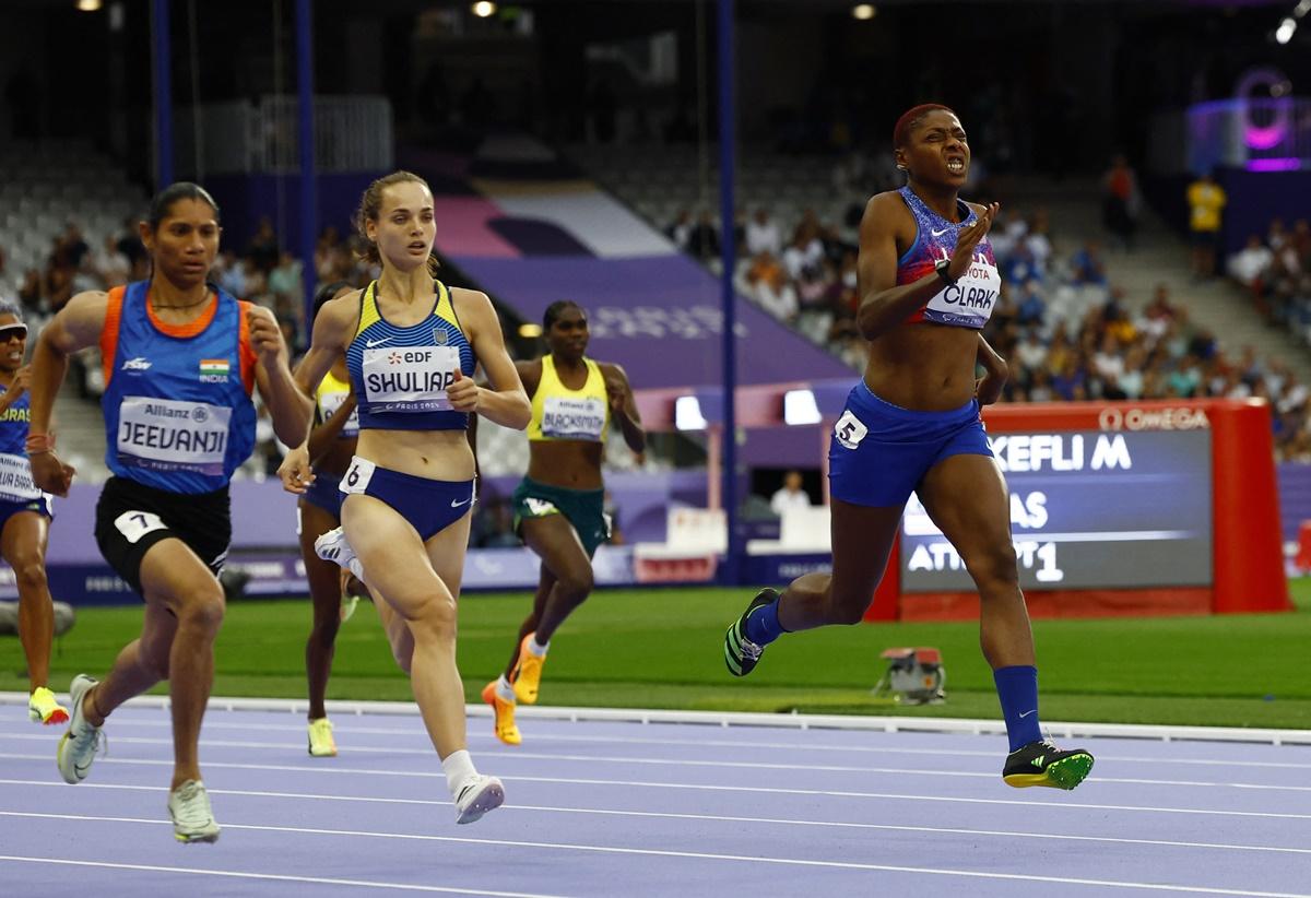 India's Deepthi Jeevanji, Ukraine's Yuliia Shuliar and Breanna Clark of the United States during the women's 400 metres T20 run final.