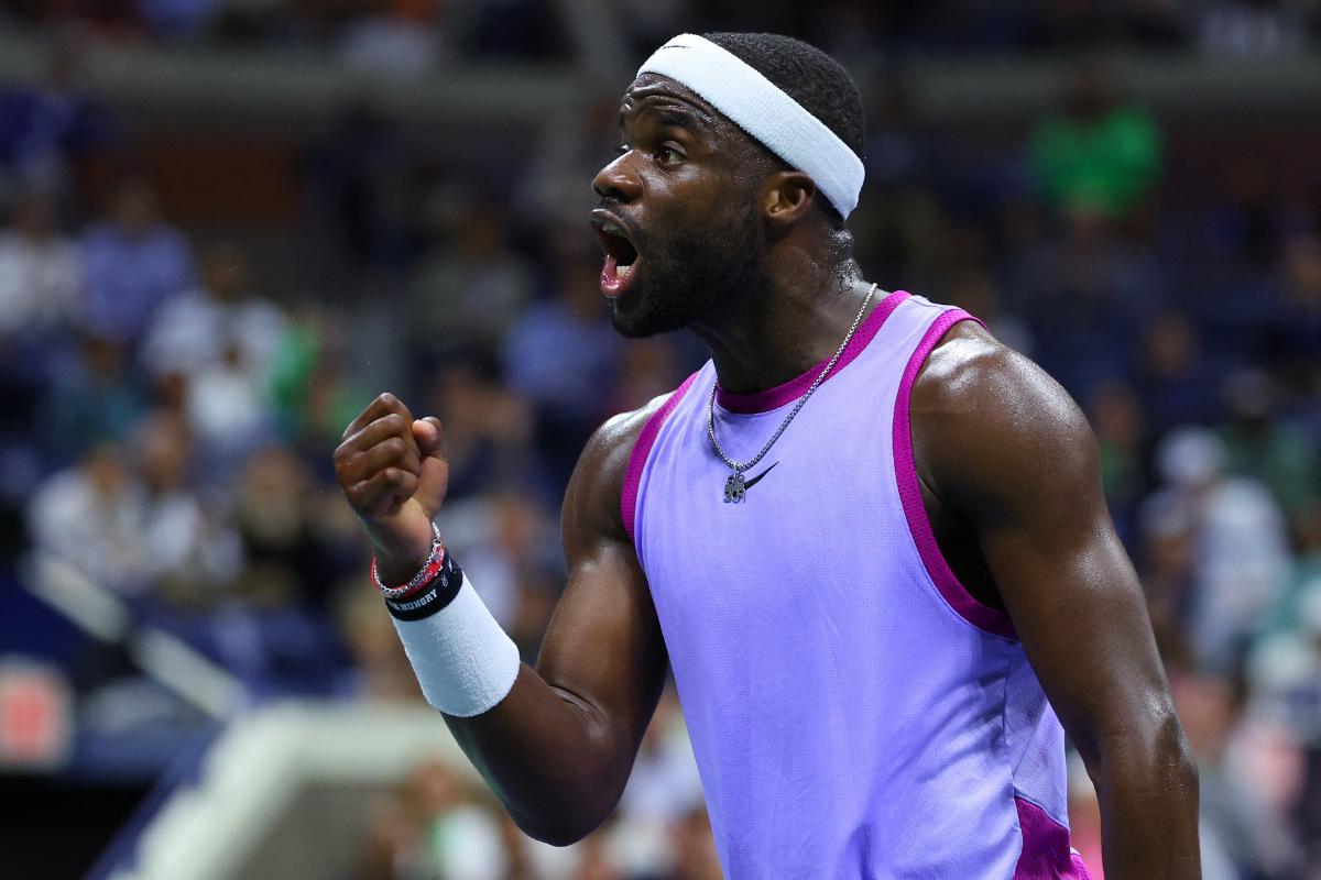 American Frances Tiafoe celebrates a point during his US Open quarter-final match against Bulgaria's Grigor Dimitrov