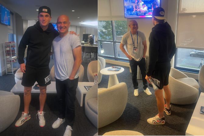 Britain's Jack Draper shoes off his shoes to Andre Agassi 