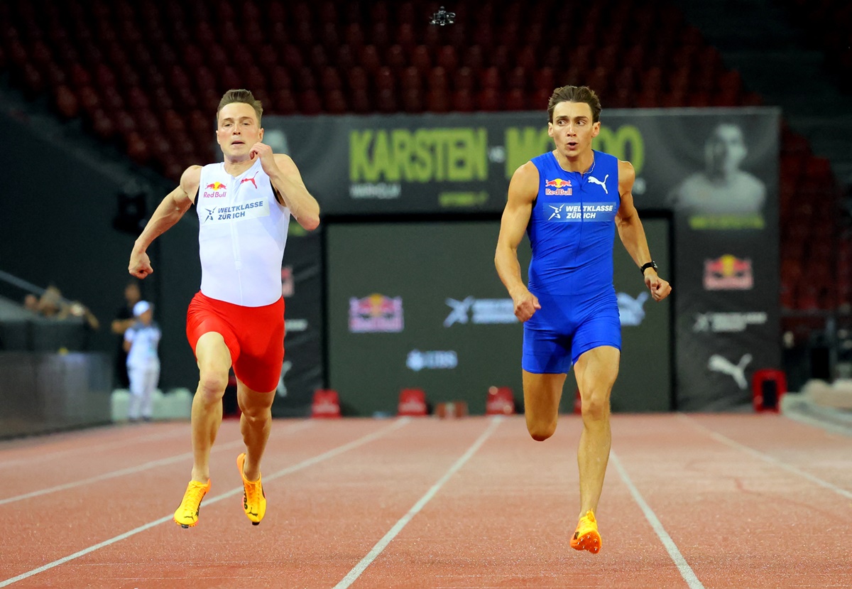 Sweden's Armand Duplantis crosses the finish line to win the 100 metres exhibition race against Norway's Karsten Warholm at the Diamond League meeting in Stadion Letzigrund, Zurich, Switzerland, on Wednesday.