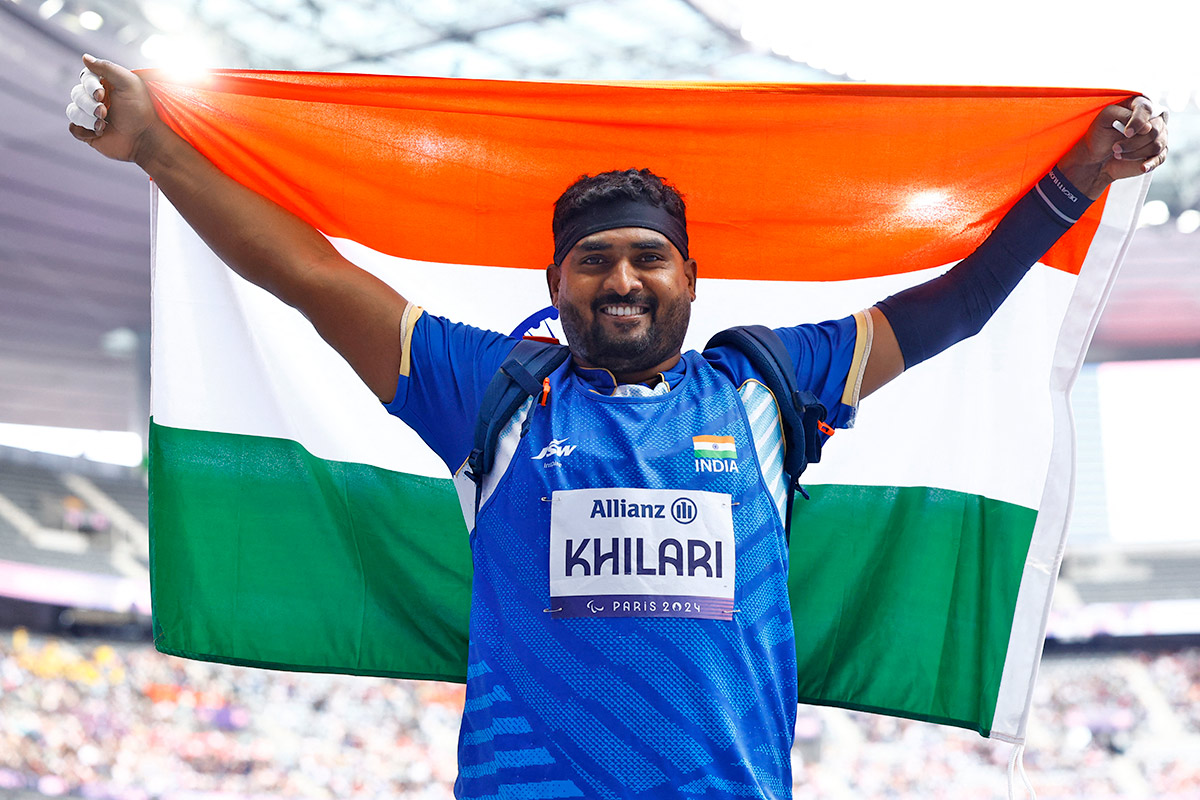 Sachin Sarjerao Khilari of India celebrates winning the silver medal