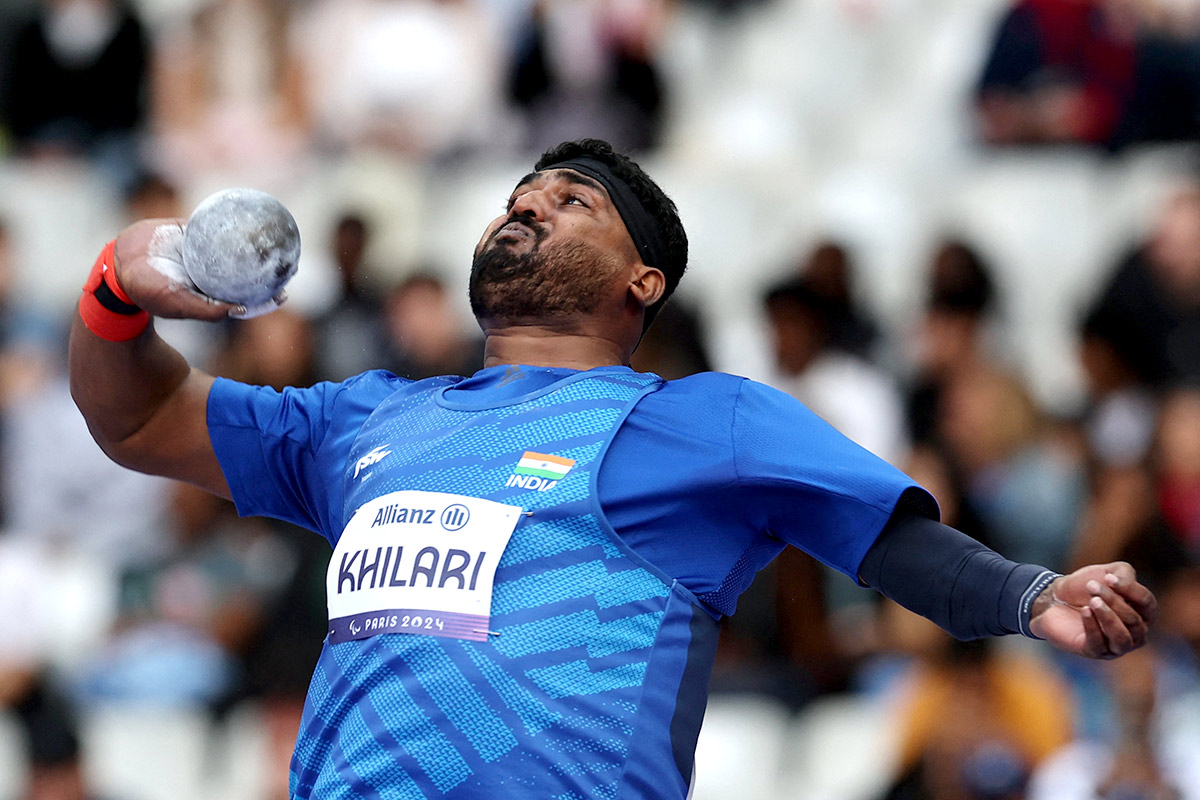 Sachin Sarjerao Khilari of India celebrates winning the silver medal