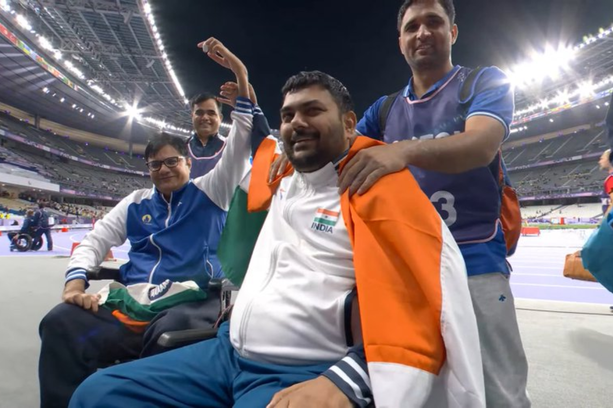 A beaming Amit Kumar Saroha (left) with his mentee Dharambir Singh after the latter won the gold medal in the Men's Club Throw F51 event at the Paris Paralympics on Wednesday