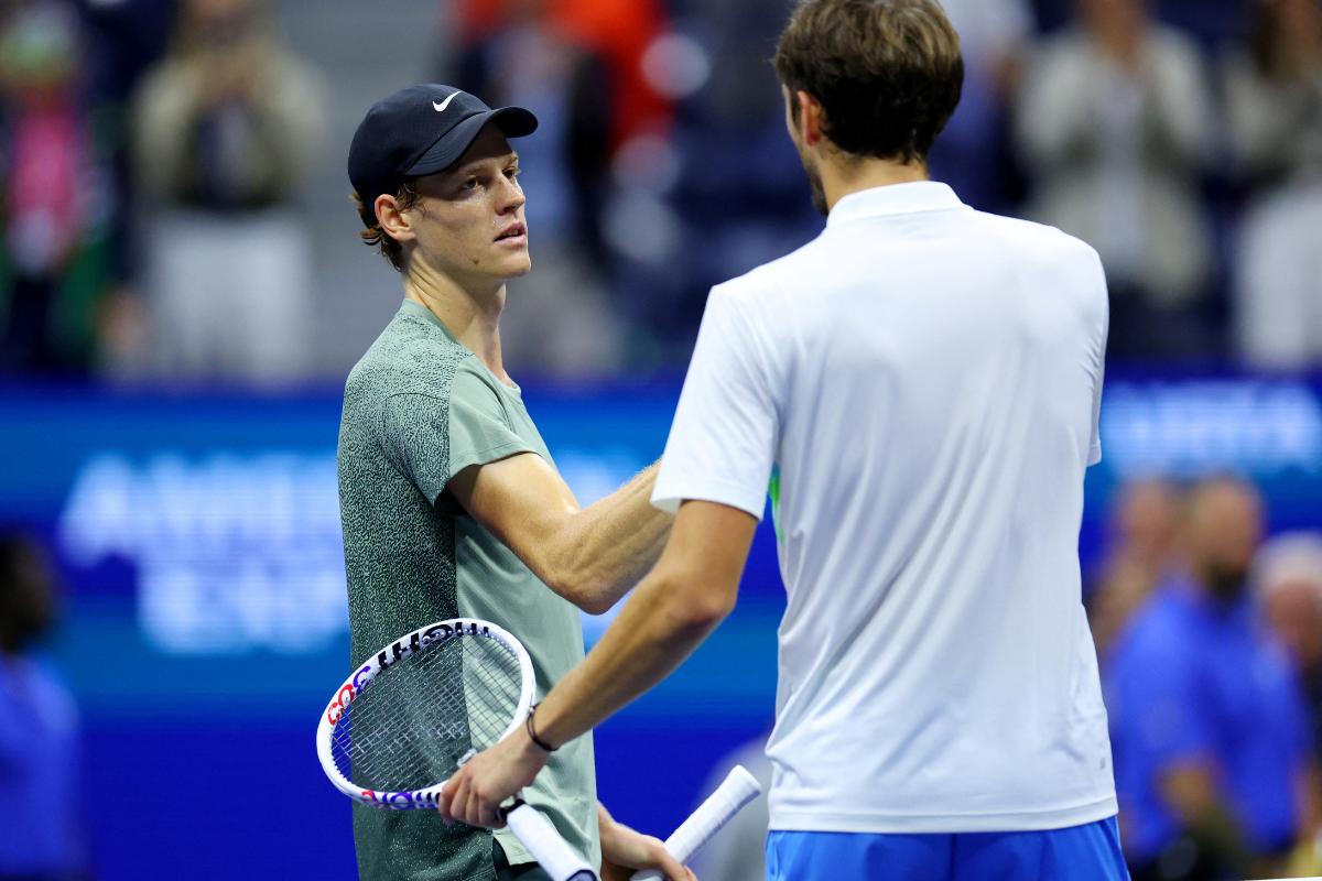 Italy's Jannik Sinner greets Russia's Daniil Medvedev after winning his quarter-final match 