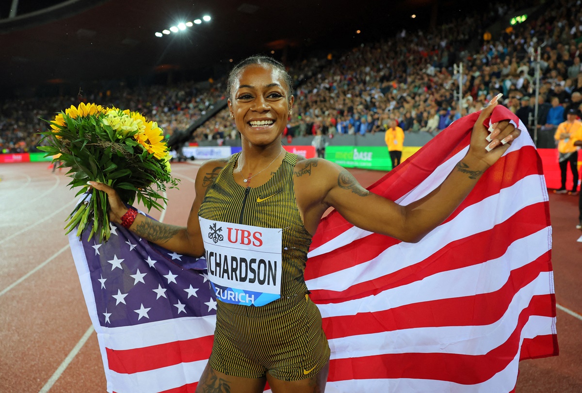 World champion Sha'Carri Richardson of the United States celebrates after winning the women's 100 metres.