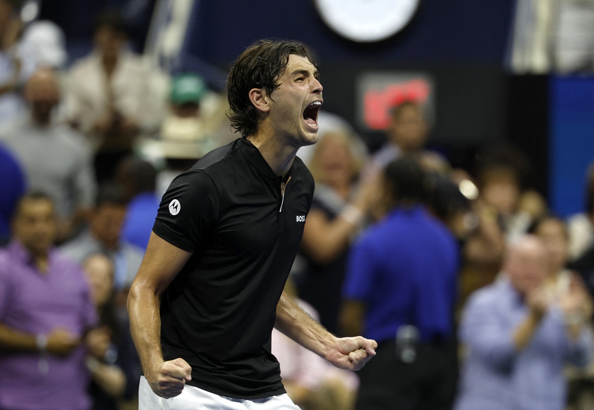 Taylor Fritz of the United States celebrates winning his US Open men's singles semi-final against compatriot Frances Tiafoe at Flushing Meadows, New York, on Friday.