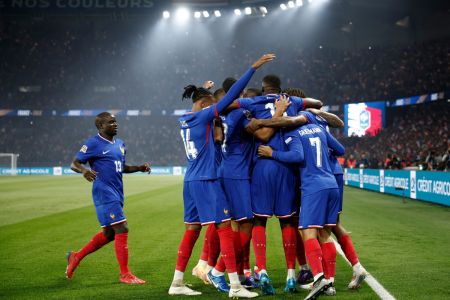 France's Bradley Barcola celebrates scoring their first goal with teammates during their Nations League League A Group 2  match against Italy at Parc des Princes, Paris, France, on Friday