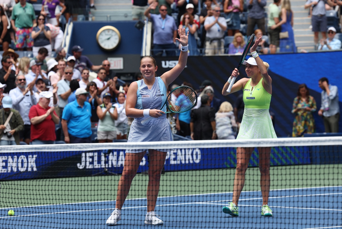 Latvia's Jelena Ostapenko and Ukraine's Lyudmyla Kichenok celebrate sealing victory over France's Kristina Mladenovic and Shuai Zhang in the US Open women's doubles final at Flushing Meadows, New York, on Friday.