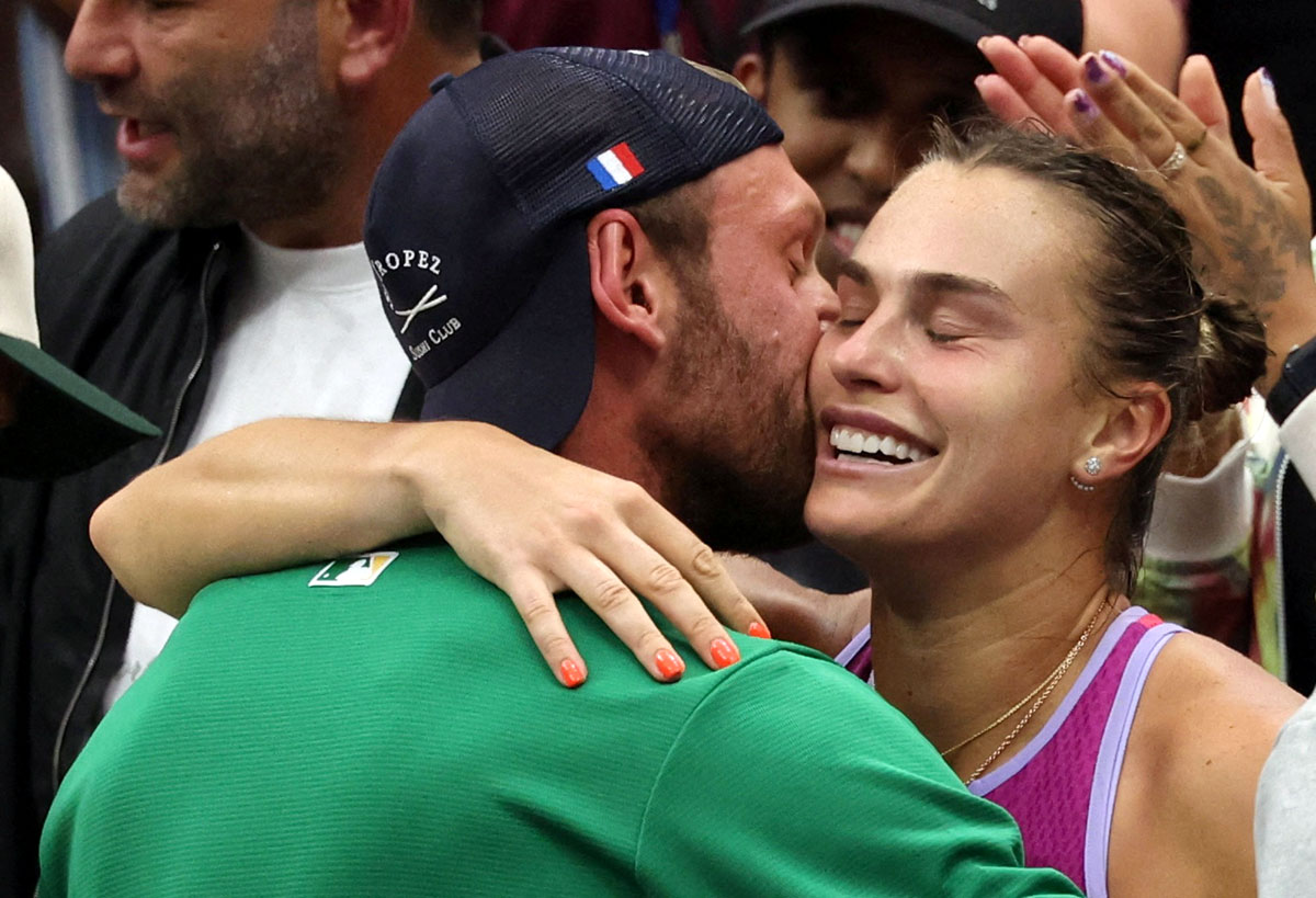 Aryna Sabalenka celebrates with partner Georgios Frangulis