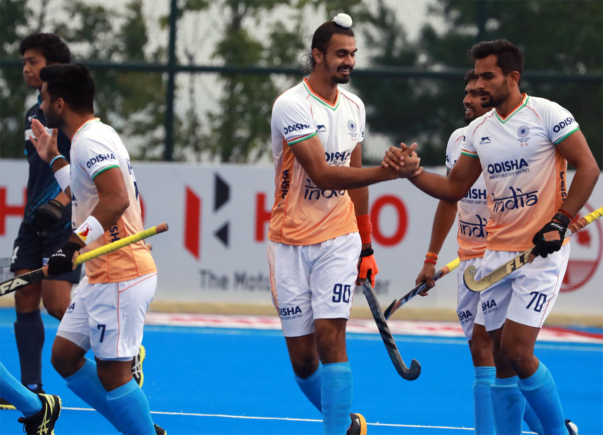 India's players celebrate a goal