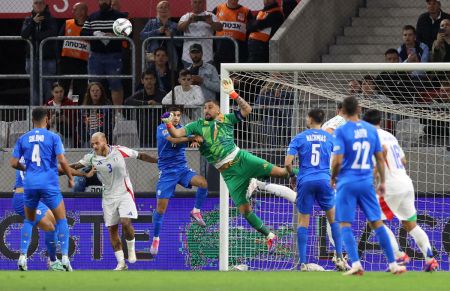 Italy goalkeeper Gianluigi Donnarumma makes a save