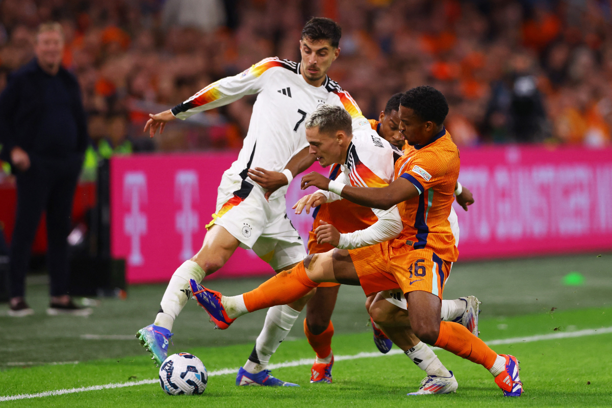 Netherlands' Quinten Timber and Jurrien Timber in action with Germany's Florian Wirtz and Kai Havertz during their Nations League - League A - Group 3 match at Johan Cruyff Arena, Amsterdam, Netherlands  on Tuesday