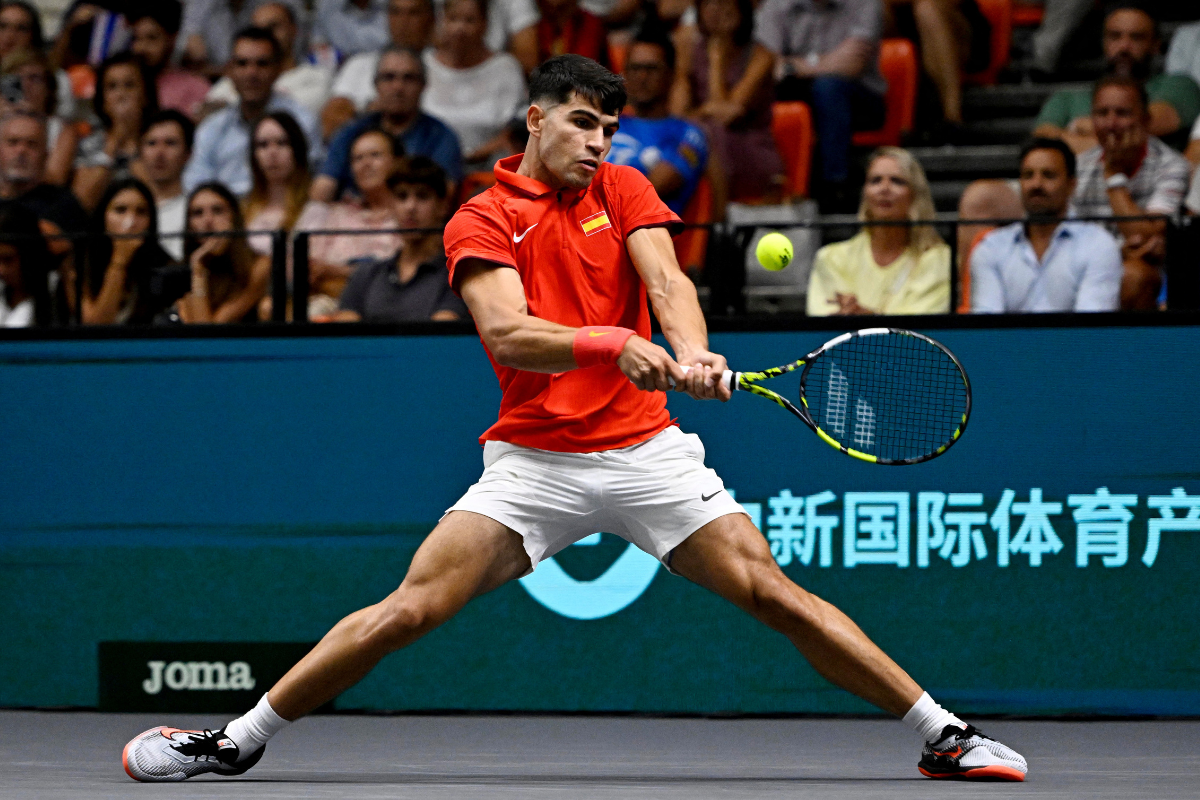 Spain's Carlos Alcaraz in action during his singles match against Czech Republic's Tomas Machac in their Davis Cup Group B tie at Pabellon Fuente de San Luis, Valencia, Spain, on Wednesday 