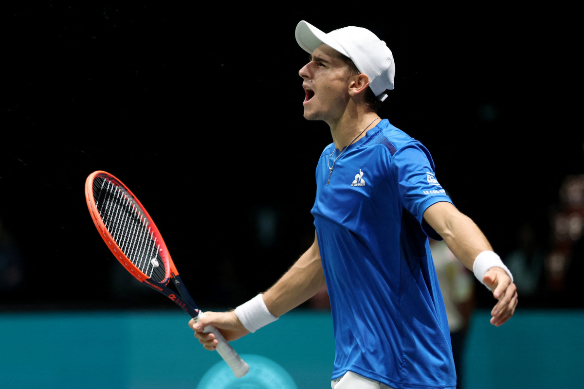 Italy's Matteo Arnaldi celebrates winning his singles match against Brazil's Thiago Monteiro in their Davis Cup Group A tie at Unipol Arena, Bologna, Italy, on Wednesday