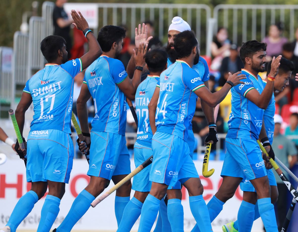 India hockey players celebrate a goal