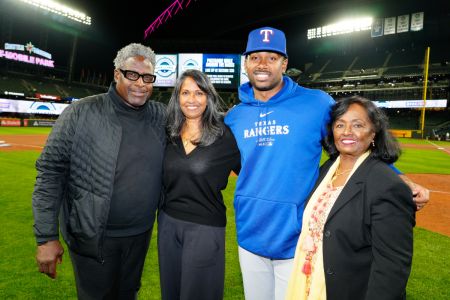 Kumar Rocker with his parents Tracy and Lalitha and a relative