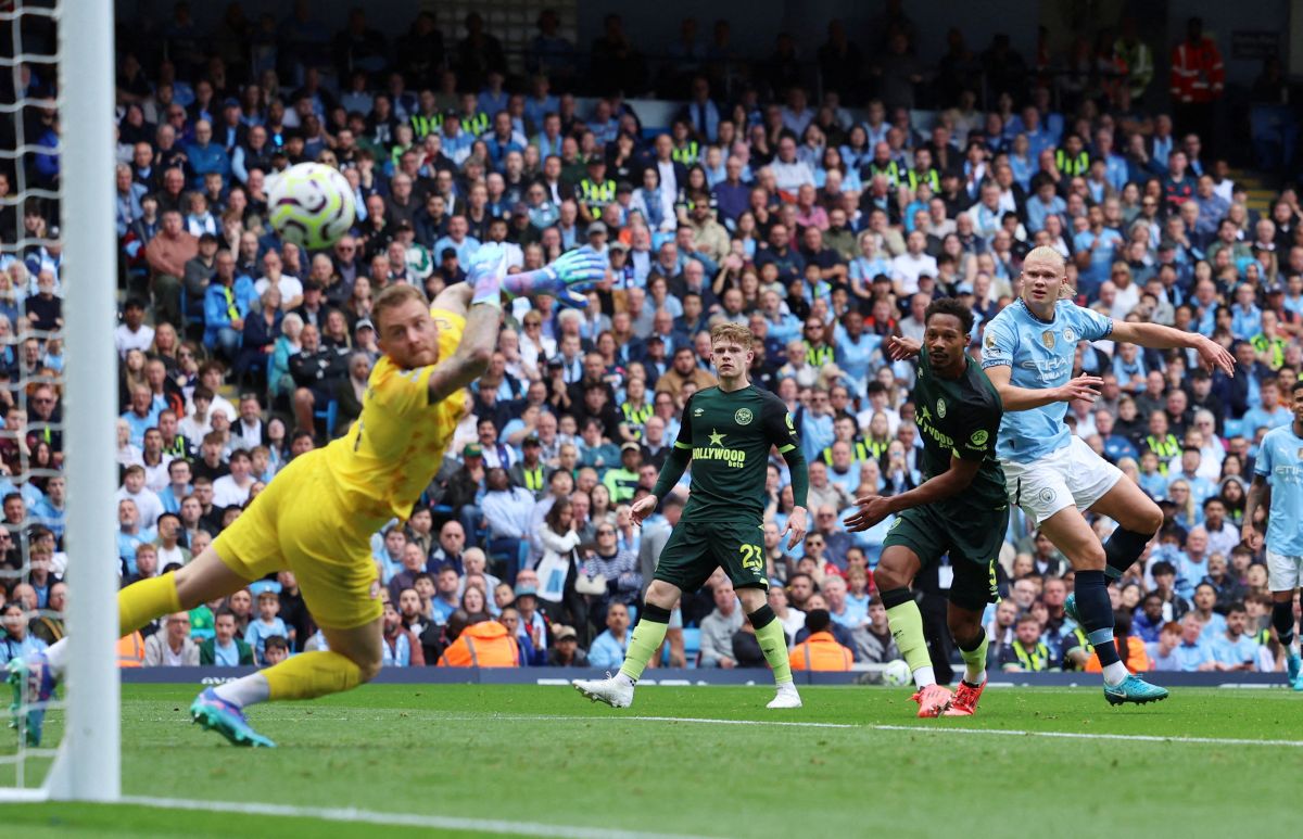 Manchester City's Erling Haaland scores their first goal against Brentford