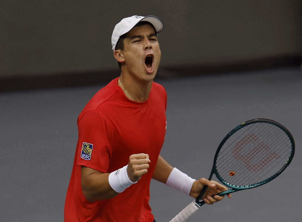 Mackenzie McDonald of the United States celebrates winning his Davis Cup Group C match against Slovakia's Lukas Klein, at the Hengqin International Tennis Center, Zhuhai, China, on Friday.