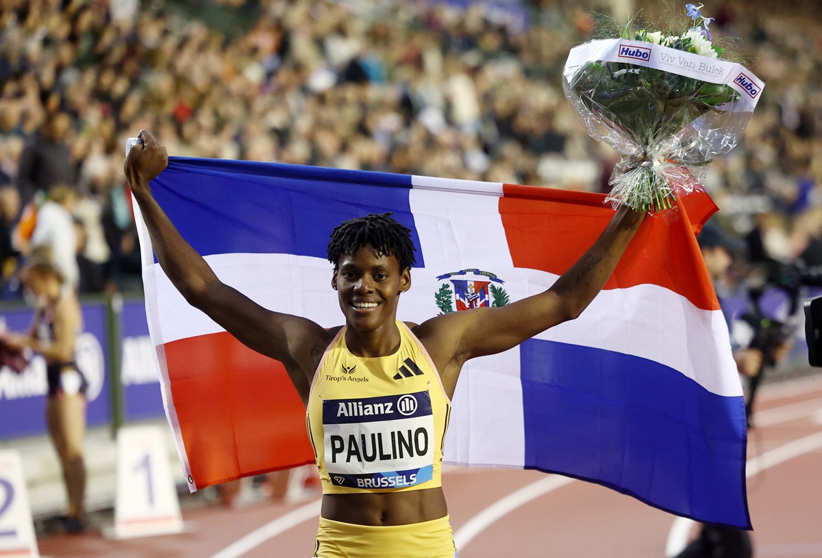 The Dominican Republic's Marileidy Paulino celebrates after winning the women's 400 metres.