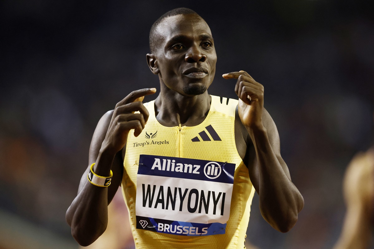 Kenya's Emmanuel Wanyonyi celebrates after winning the men's 800 metres.