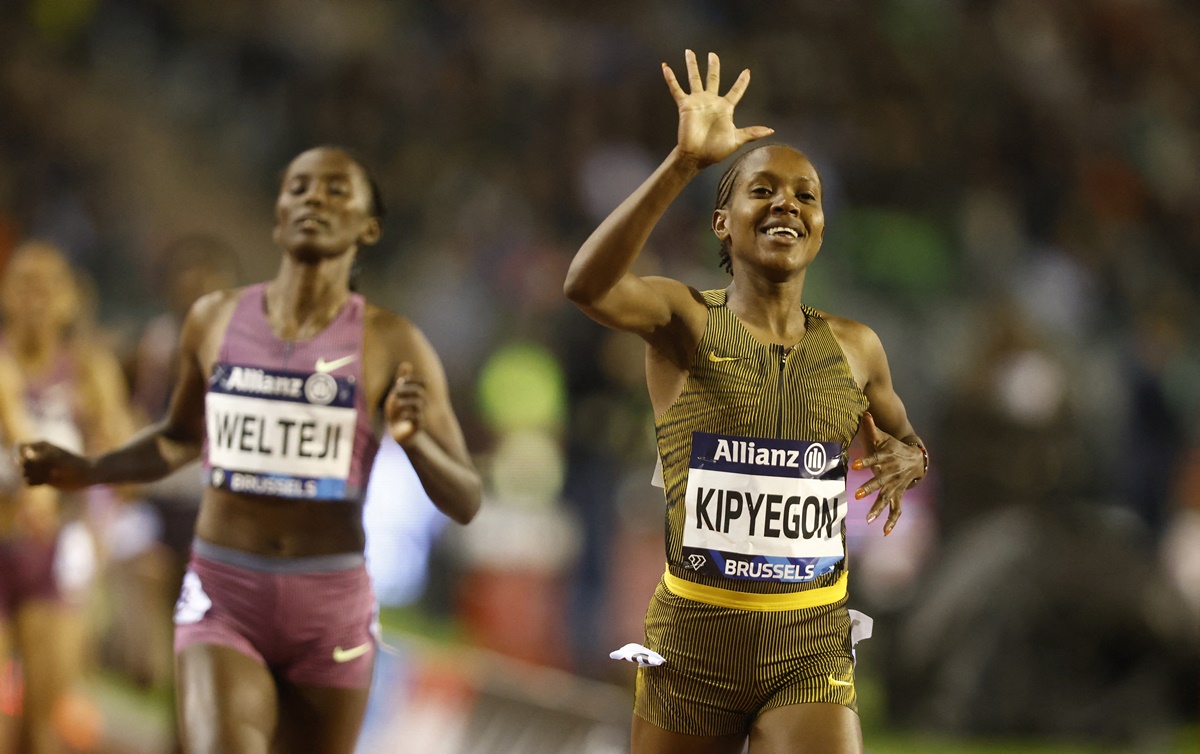 Kenya's Faith Kipyegon celebrates winning the women's 1500 metres, her fifth Diamond League title, in the season-ending meet at the King Baudouin Stadium in Brussels on Saturday.