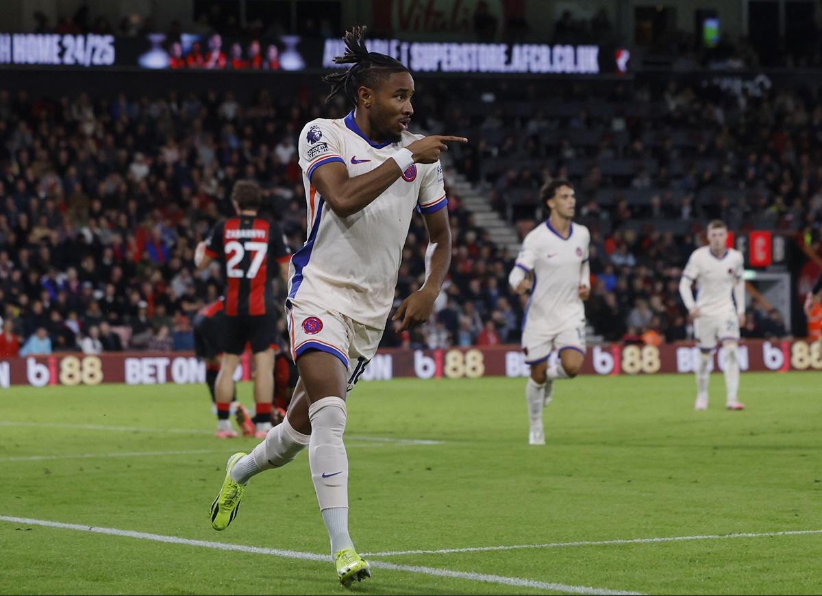 Christopher Nkunku celebrates scoring late and winning the match for Chelsea.