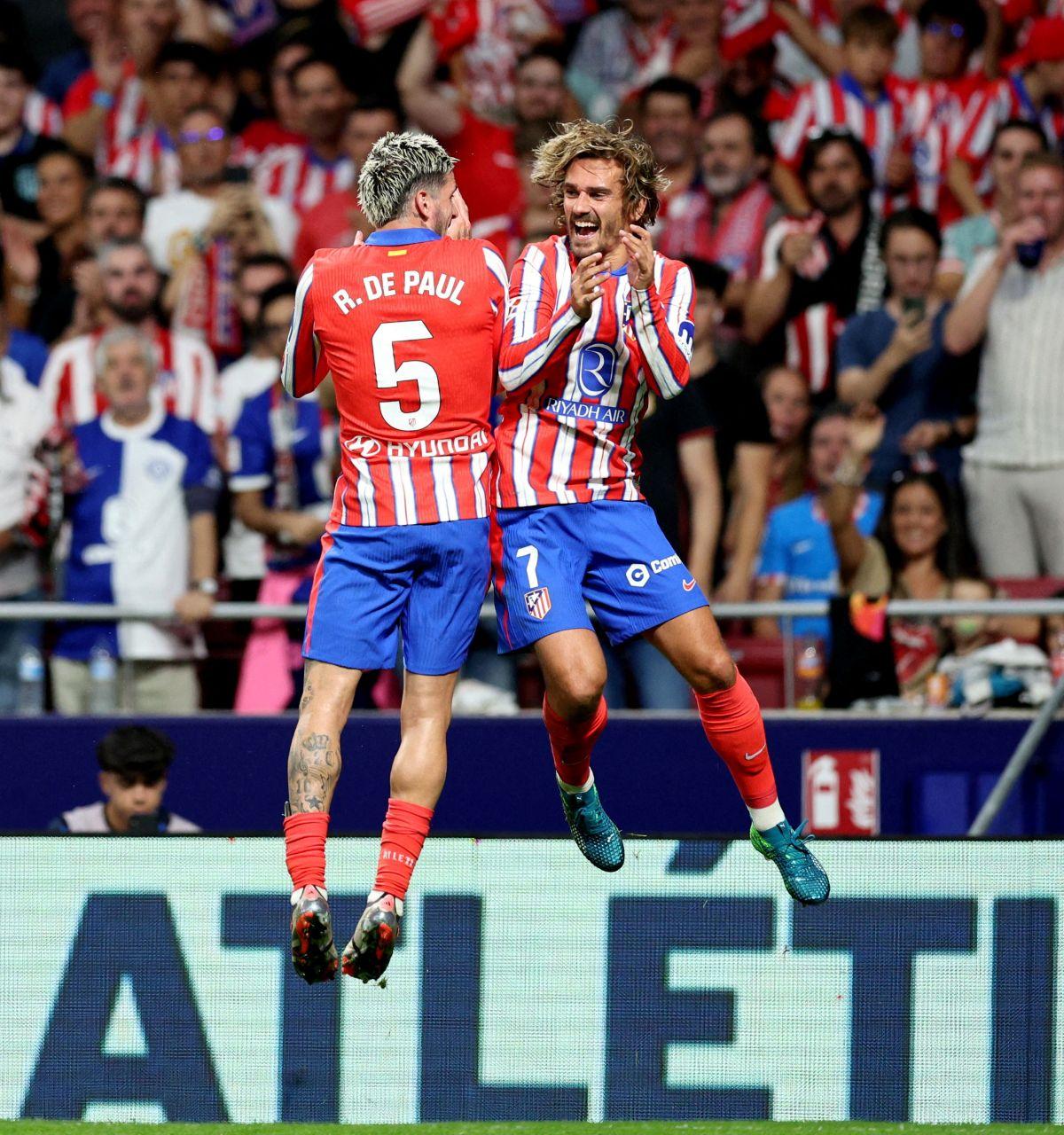 Atletico Madrid's Antoine Griezmann celebrates scoring their second goal with Rodrigo De Paul 