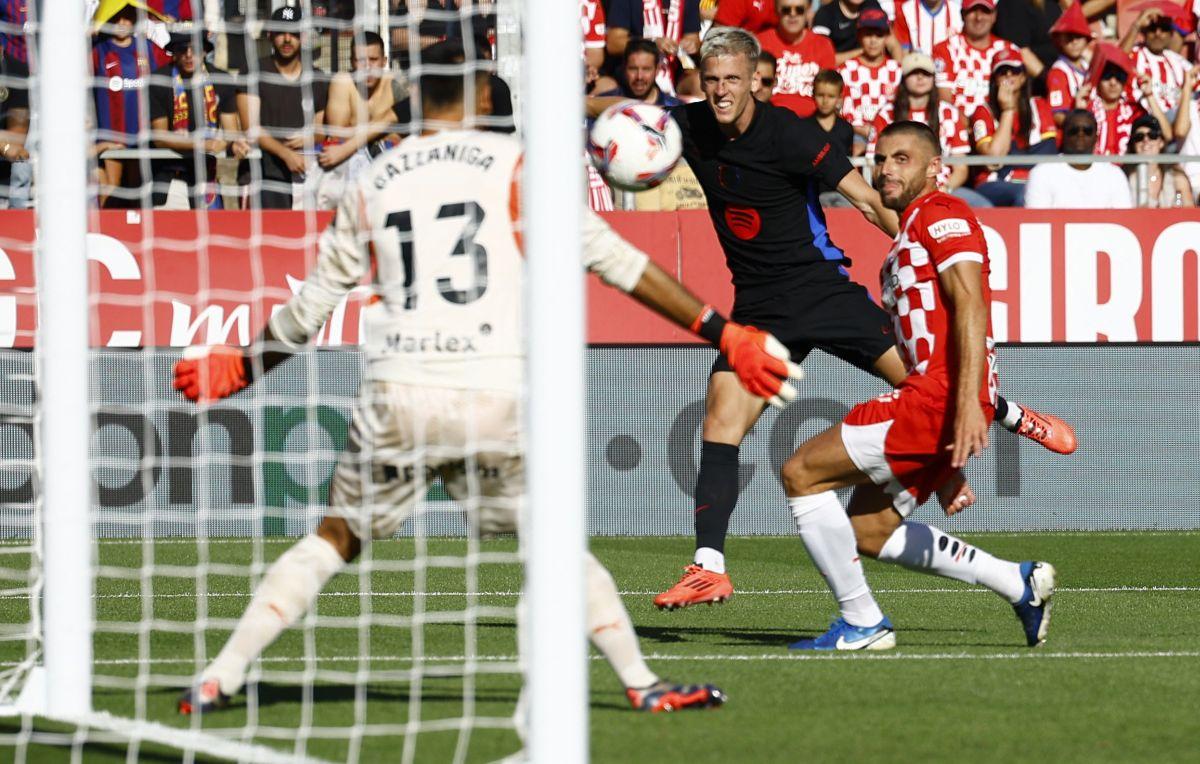 FC Barcelona's Dani Olmo scores their third goal