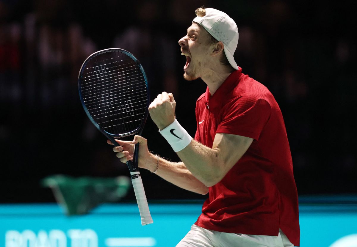 Canada's Denis Shapovalov celebrates winning his singles match against Britain's Daniel Evans 