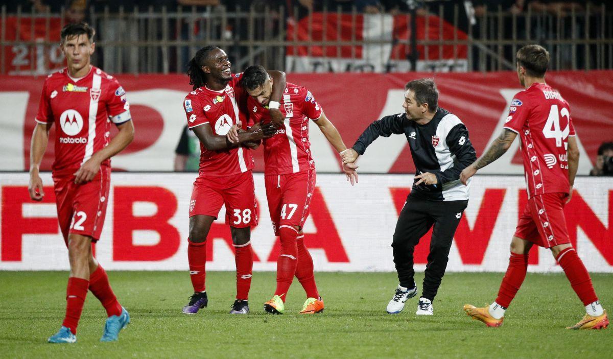 Monza's Dany Mota celebrates scoring their first goal with Warren Bondo