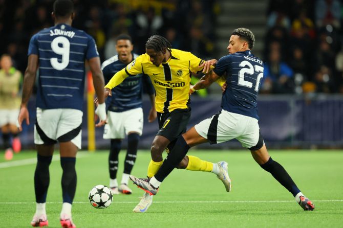 Young Boys' Joel Monteiro in action with Aston Villa's Morgan Rogers during their match at Stadion Wankdorf, Bern, Switzerland 