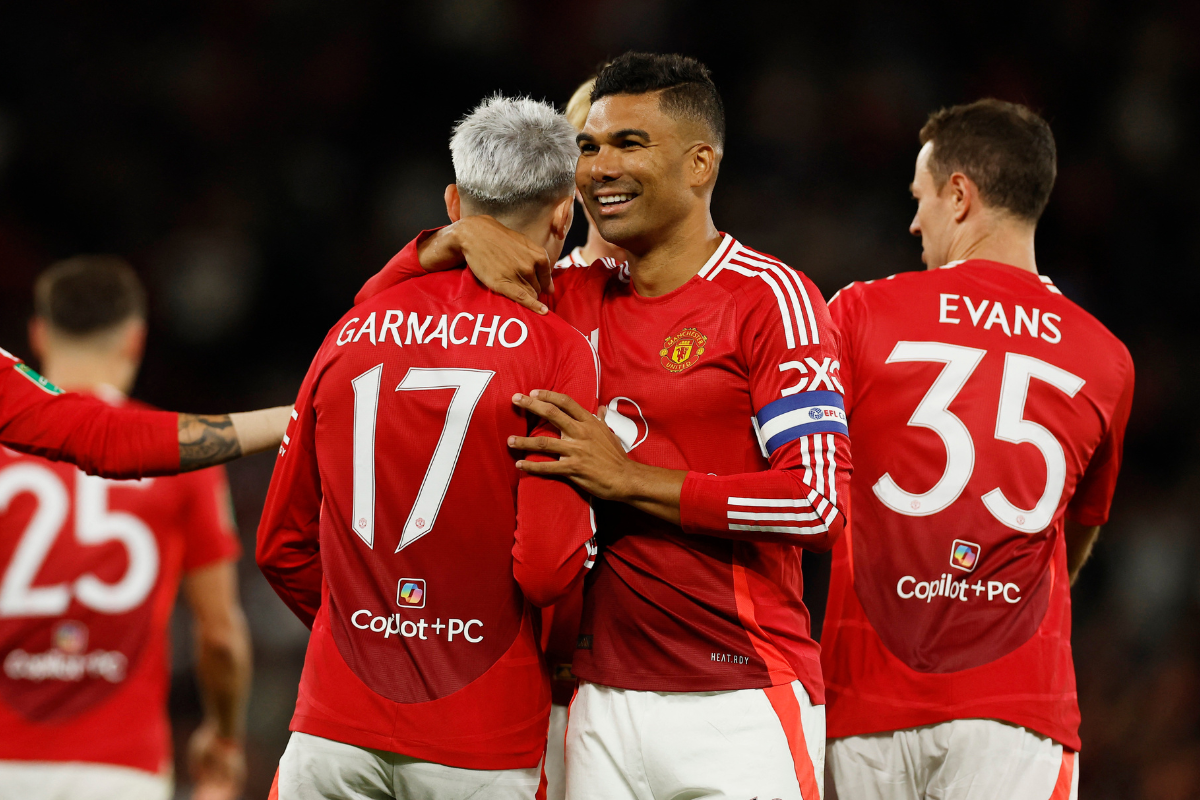 Manchester United's Alejandro Garnacho celebrates scoring their fourth goal with Casemiro